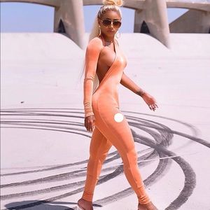 Orange one piece jumpsuit